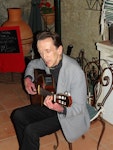 Michel Eliard entertaining with his fabulous classical guitar